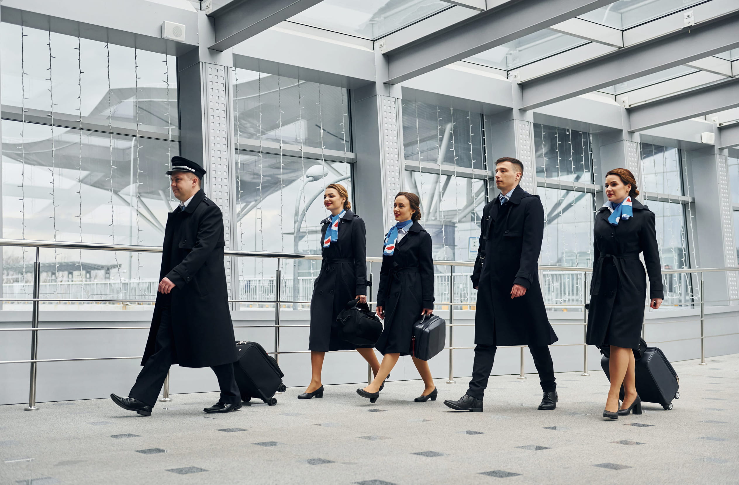 Aeroplane crew in uniform walking together