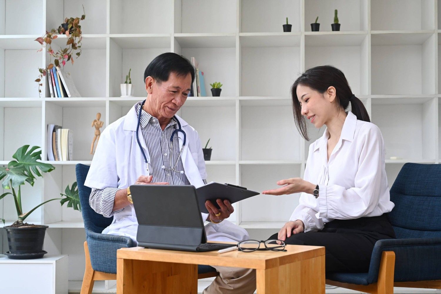 Doctor Consulting A Patient